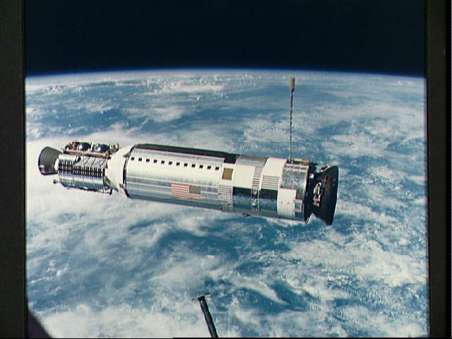 Photo of Agena in Earth orbit .